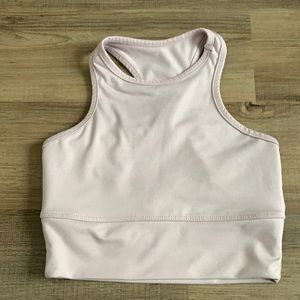 Revolve Pink sport bra/cropped tank crossed back